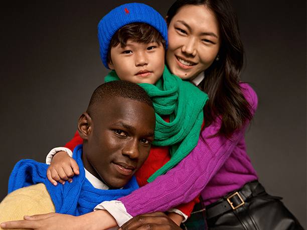 3 kids posing together in Polo Ralph Lauren attire